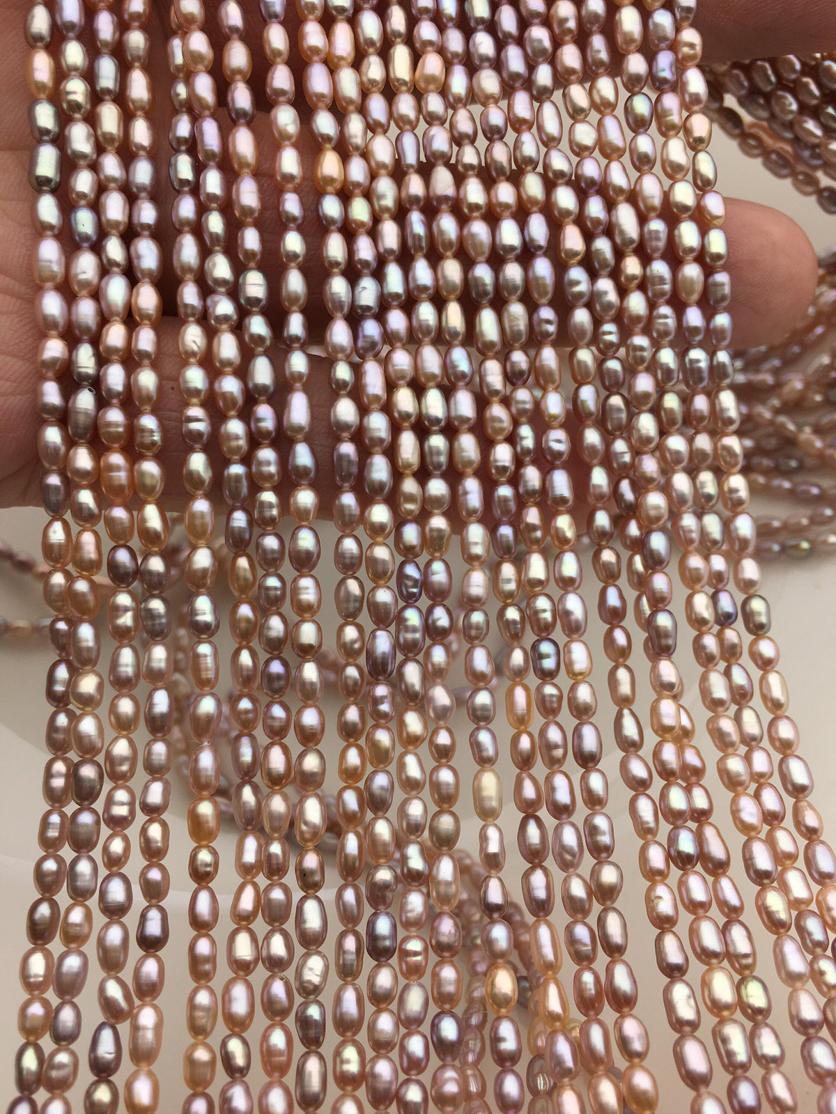 Pink-Purple Rice Freshwater Pearl Strand — 2.8–3 × 3.5–5 mm
