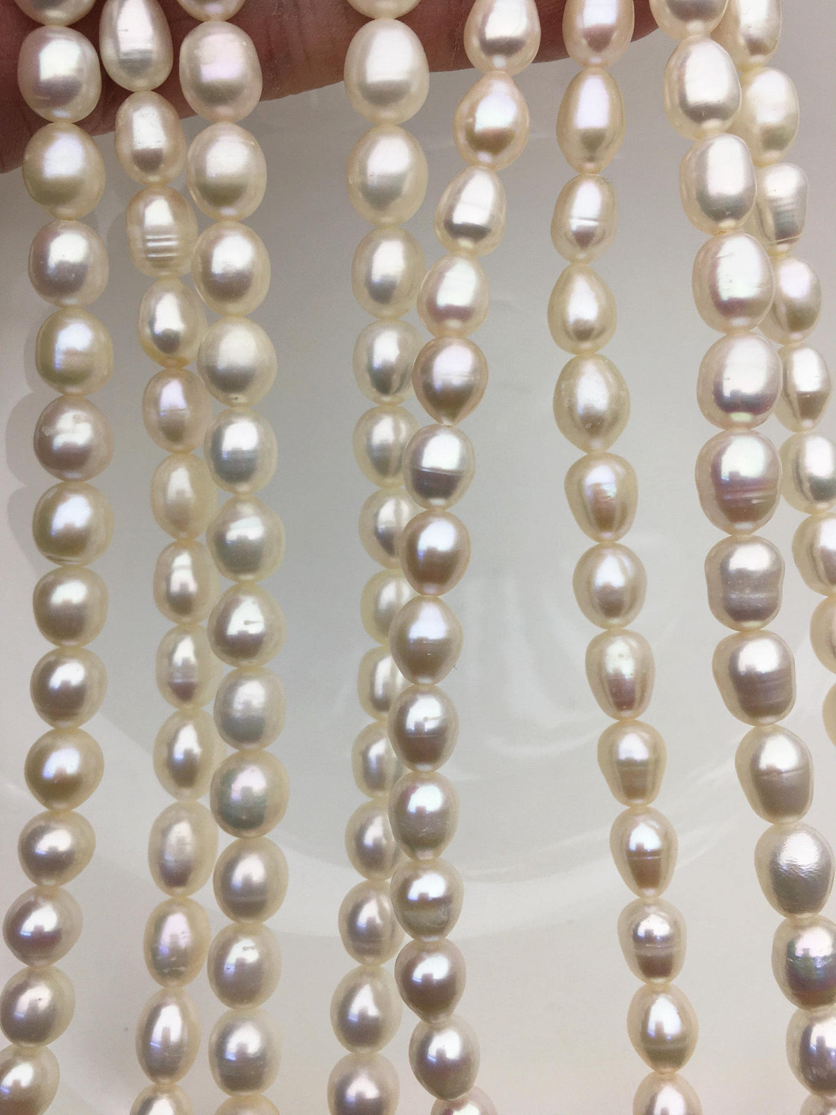 AA+ 6.3-7.2mm*7-10mm white oval rice freshwater pearls,LR7-2A-5