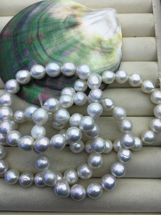 7'' AA+ 9-11mm white baroque near round Freshwater pearl Elastic string Bracelet,B8-T7