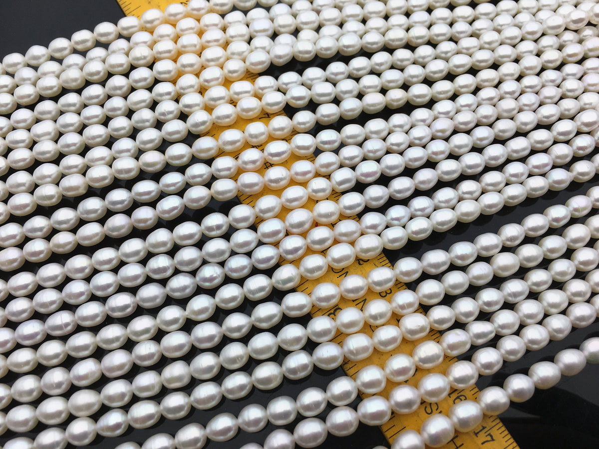AA+ 5.7-6.3mm*7-7.6mm white oval rice freshwater pearls,diy pearl beads,gift for her,Christmas,LR6-2A-2