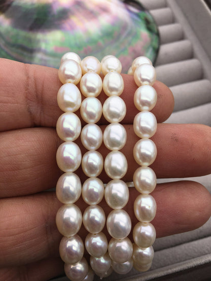 7 inchs AAA 7mm White oval Freshwater pearl Elastic string Bracelet,rice pearl bracelet,B8-040