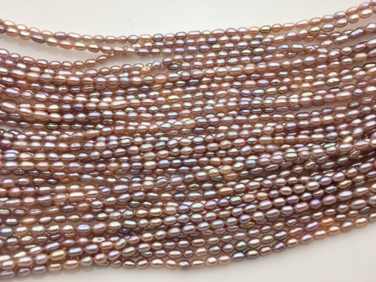 Pink-Purple Rice Freshwater Pearl Strand — 2.8–3 × 3.5–5 mm