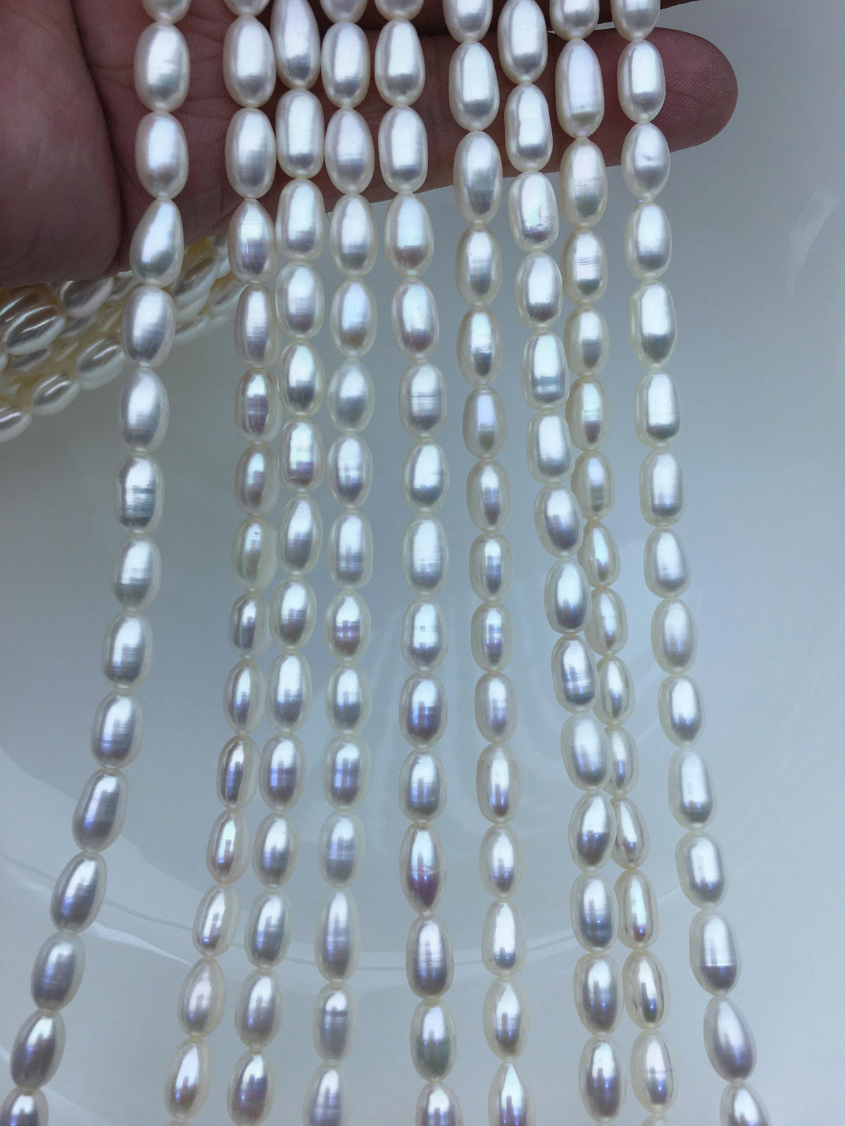 AAA 5.5-6x7-9mm white long rice freshwater pearls,Freshwater Pearl Rice Beads,LR5-3A-53
