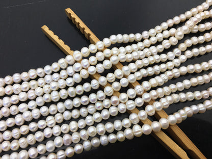 AA 5.7-6.5mm white Ring potato freshwater pearl, near round white pearl bead strand supply from China, wholesale in bulk, CR6-2A-2