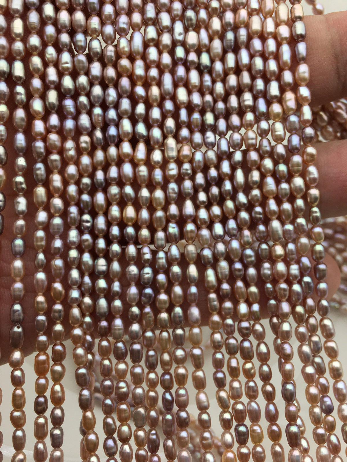 Pink-Purple Rice Freshwater Pearl Strand — 2.8–3 × 3.5–5 mm