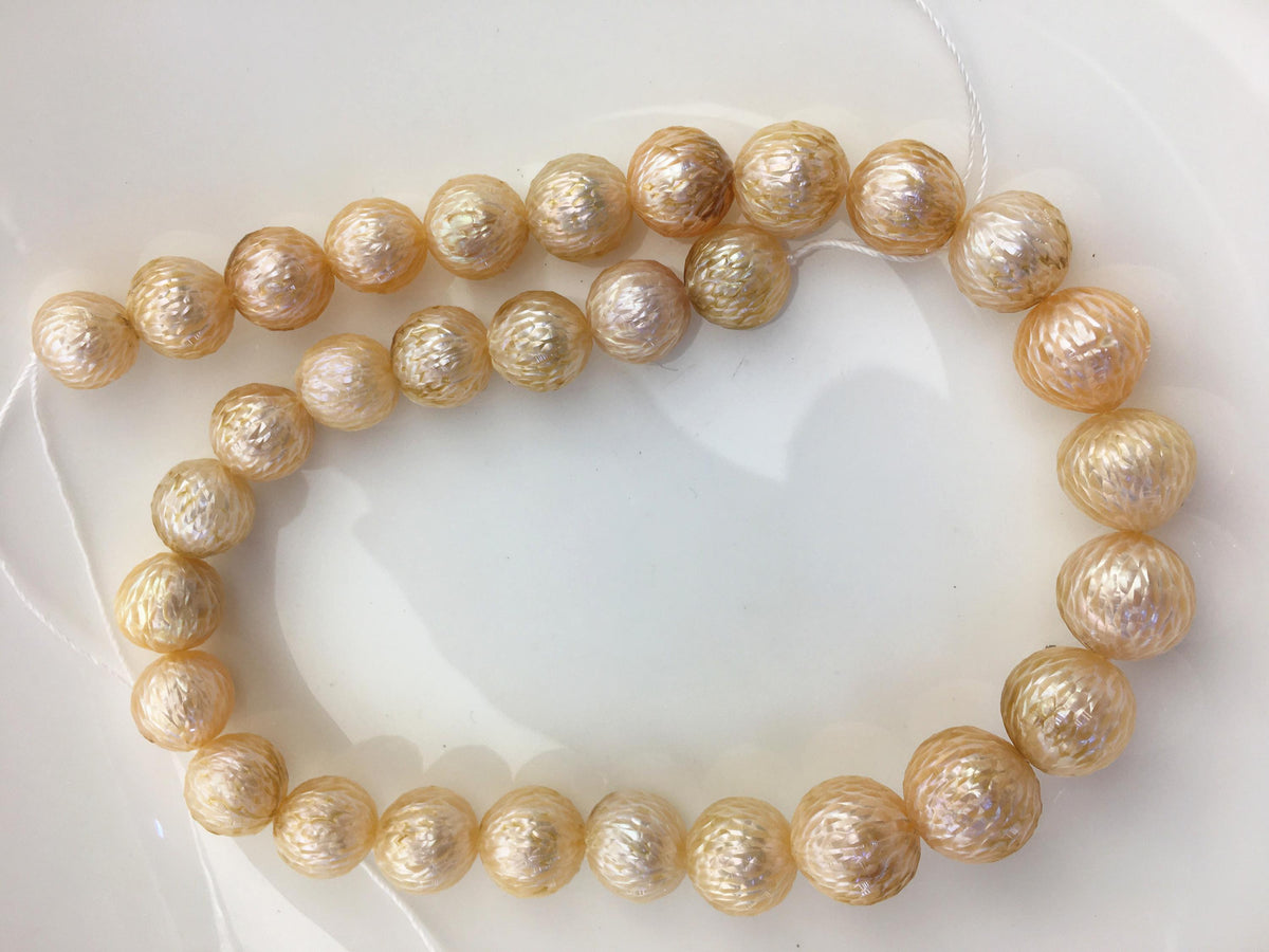 15.5'' AA+ 11-14mm Orange Near Round Carved Freshwater Pearl - Hand Carved - CAC-T26