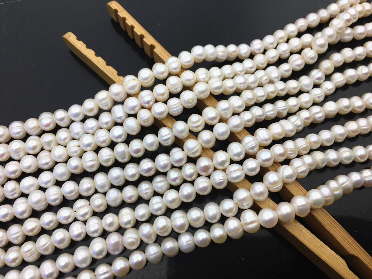 AA 5.7-6.5mm white Ring potato freshwater pearl, near round white pearl bead strand supply from China, wholesale in bulk, CR6-2A-2