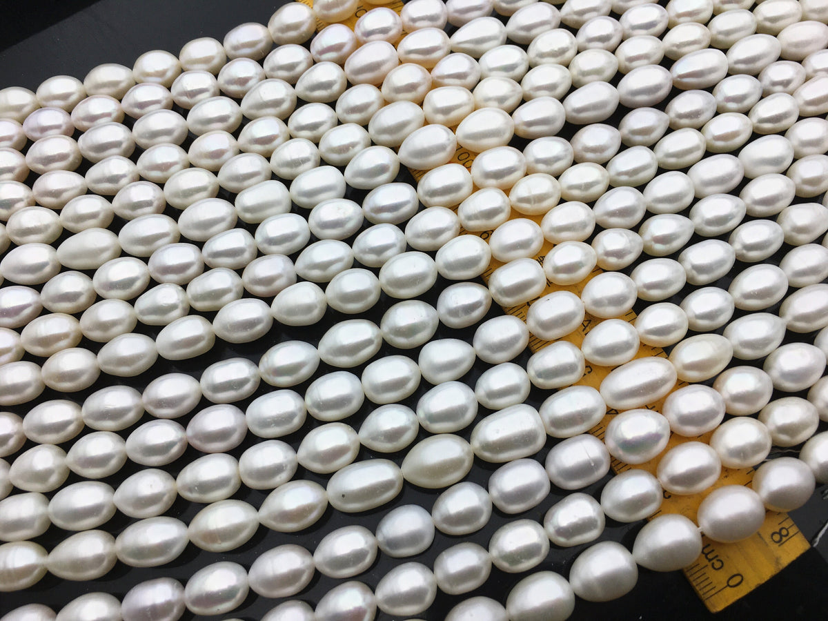AA+ 9.4-10.4mm*12.5-16mm white long rice freshwater pearls,LR10-2A-2
