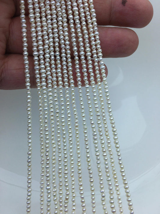 AAA 2.4-2.6mm tiny white near round seed freshwater pearl,genuine pearl strands at wholesale prices,RP2-3A-7