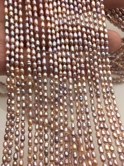 Pink-Purple Rice Freshwater Pearl Strand — 2.8–3 × 3.5–5 mm