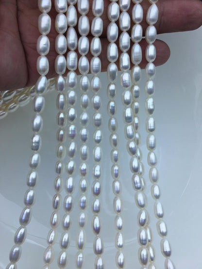 AAA 5.5-6x7-9mm white long rice freshwater pearls,Freshwater Pearl Rice Beads,LR5-3A-53